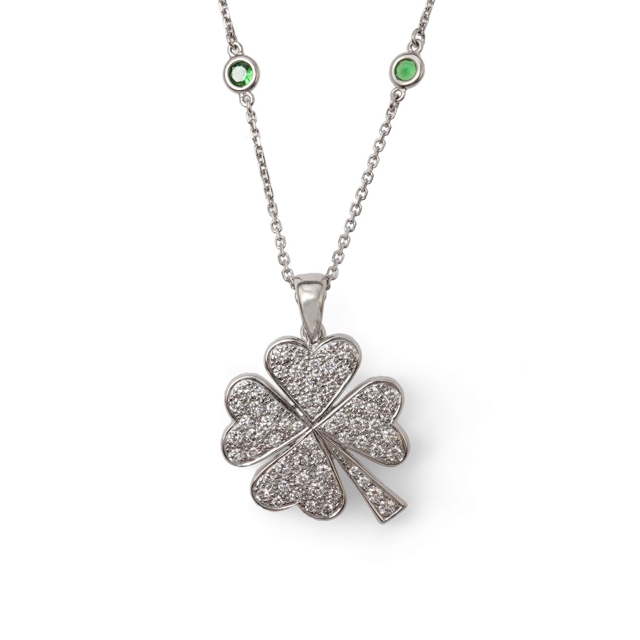 A diamond and tsavorite pendant necklace